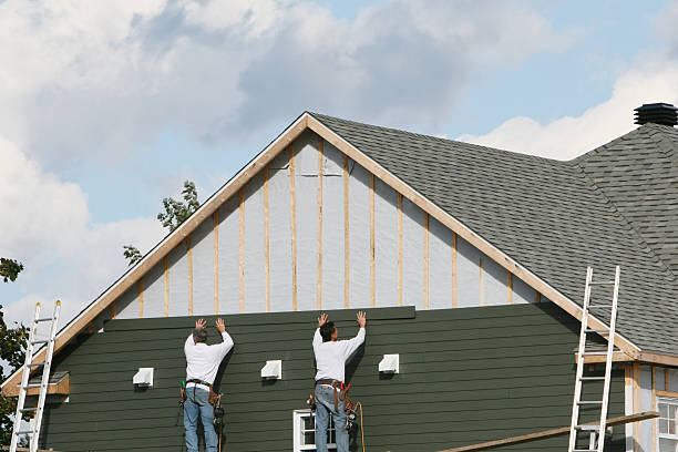 Professional Emergency Siding Repair technician working in Lindenhurst, NY
